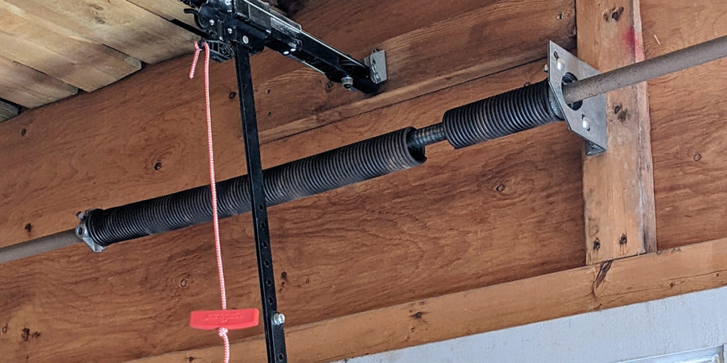 how to remove a garage door spring